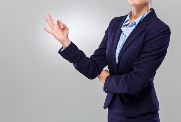 Businesswoman hand with ok sign